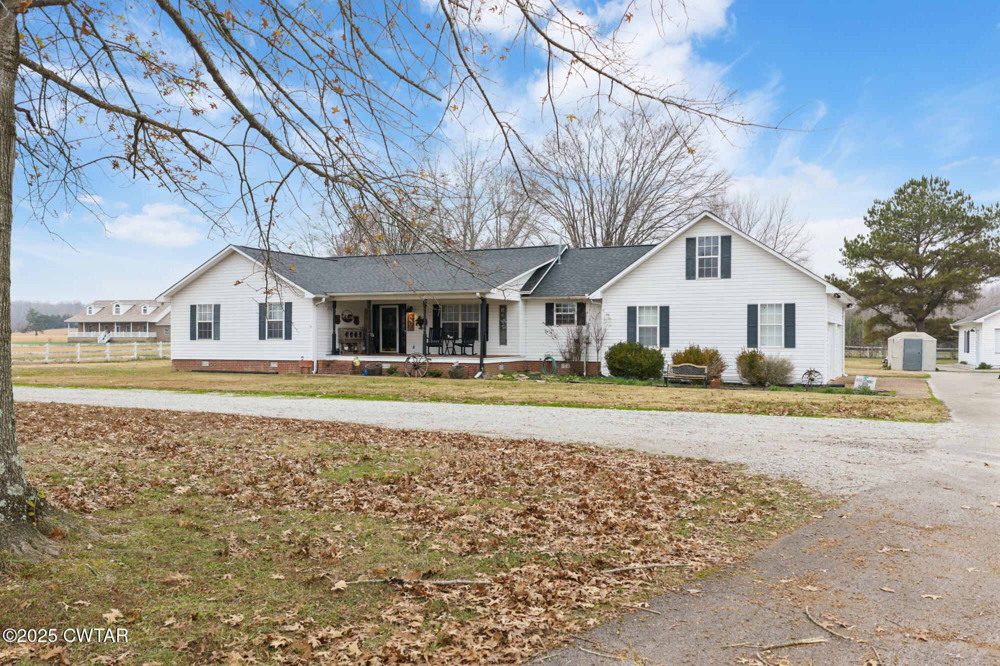 a house with trees in the background