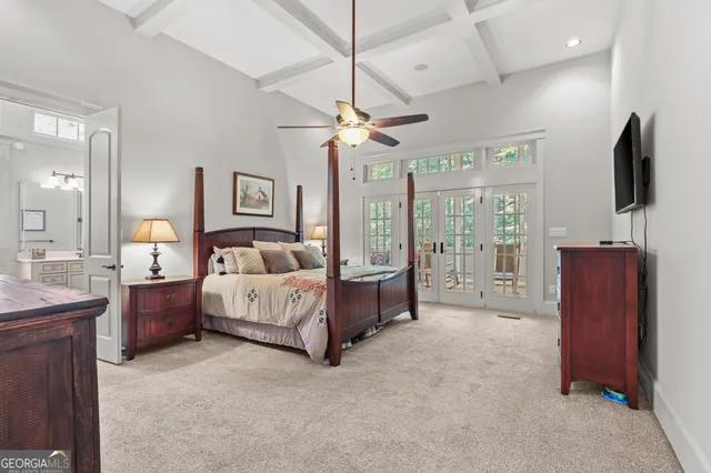 a view of a house with backyard sitting area and garden