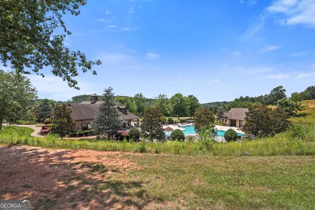 a lobby with furniture and wooden floor