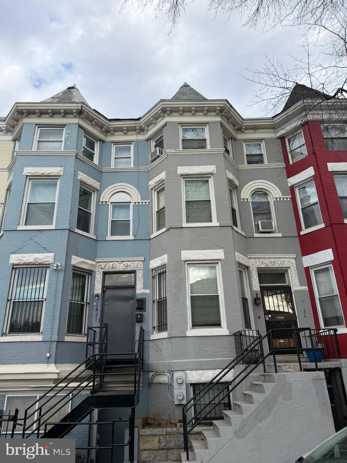 1821 North Capitol Street Northeast, Unit 2 Washington, DC 20002 - Photo 1 of 10 a front view of a building with many windows