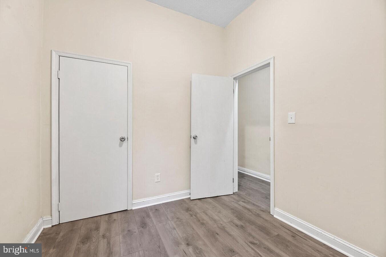 1821 North Capitol Street Northeast, Unit 2 Washington, DC 20002 - Photo 2 of 10 a view of an empty room with wooden floor