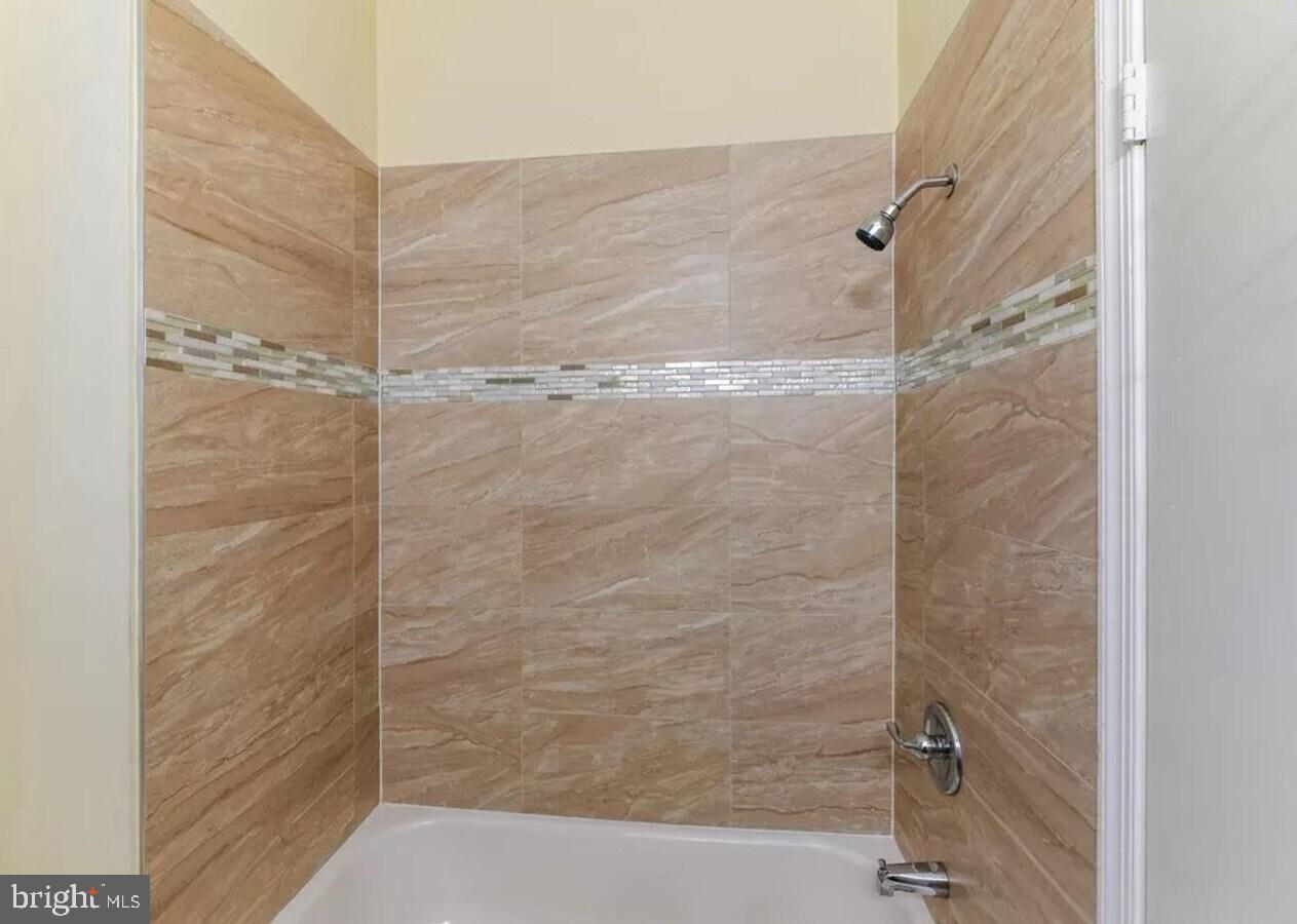 1821 North Capitol Street Northeast, Unit 2 Washington, DC 20002 - Photo 3 of 10 a bathroom with a shower