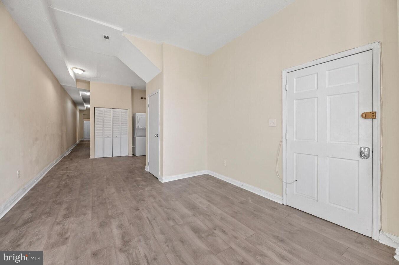 1821 North Capitol Street Northeast, Unit 2 Washington, DC 20002 - Photo 6 of 10 a view of a livingroom with wooden floor