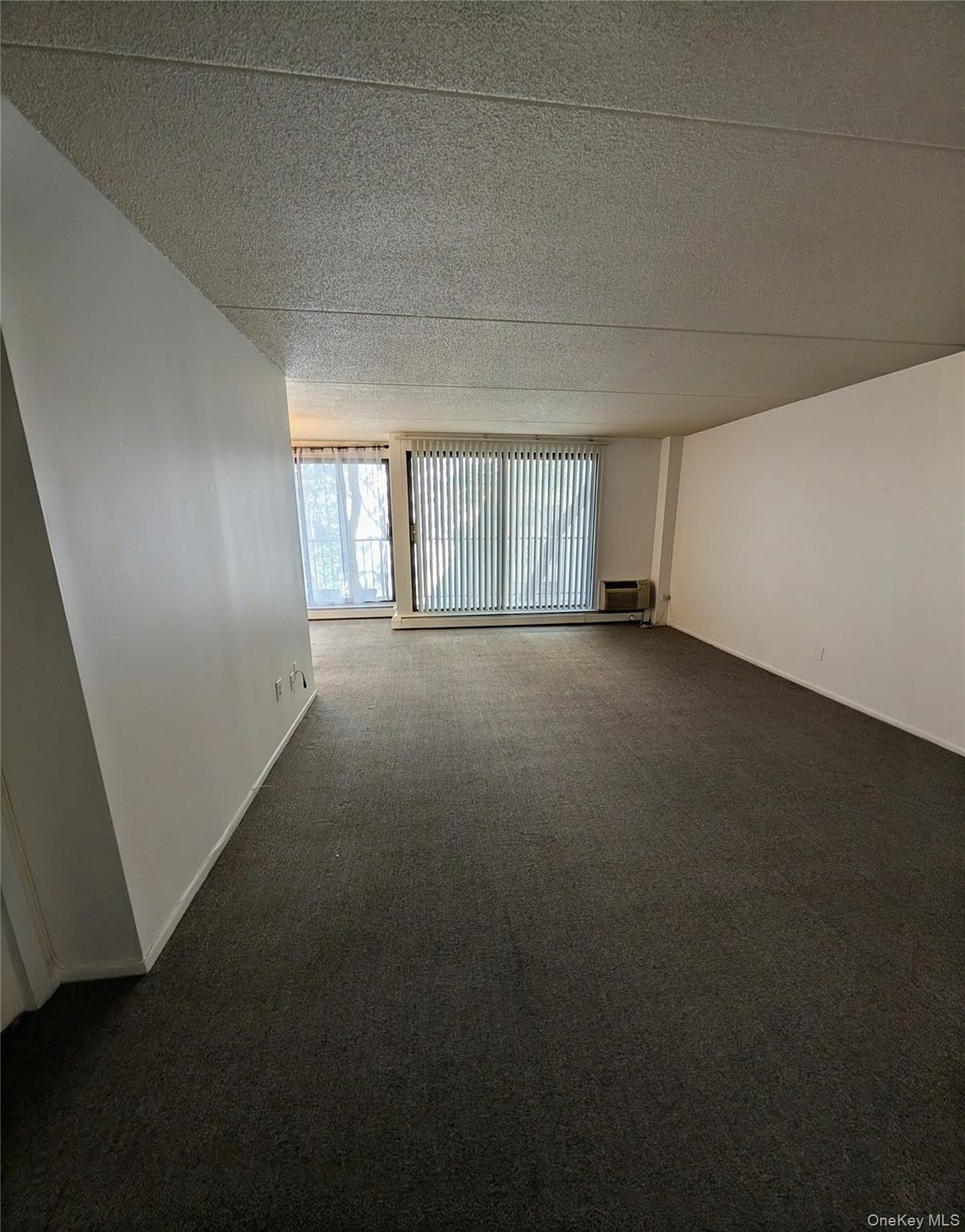 150 Overlook Avenue, Unit 4L Peekskill, NY 10566 - Photo 19 of 32 a view of an empty room with a window