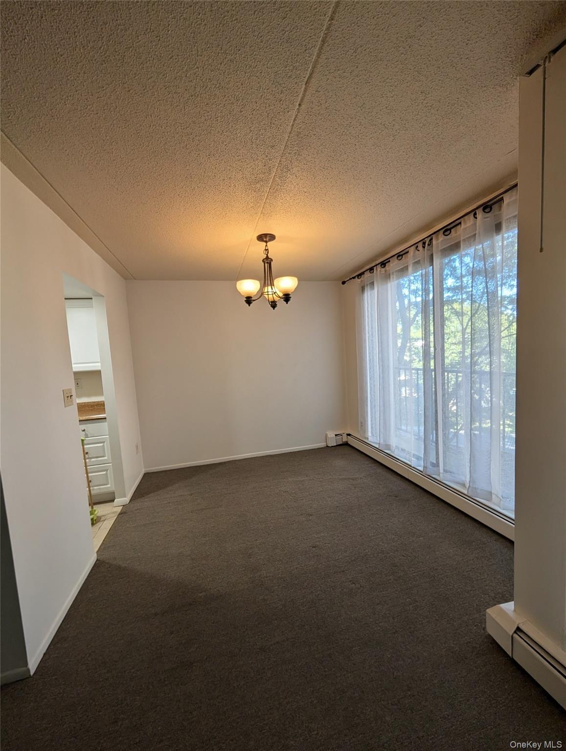 150 Overlook Avenue, Unit 4L Peekskill, NY 10566 - Photo 26 of 32 an empty room with windows