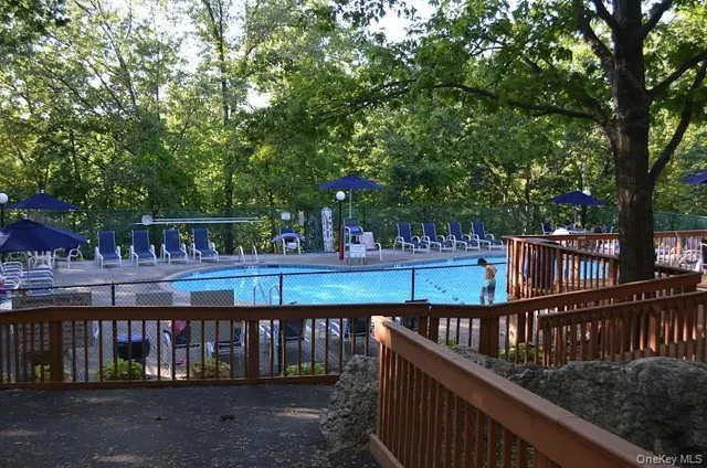 a view of house with a roof deck