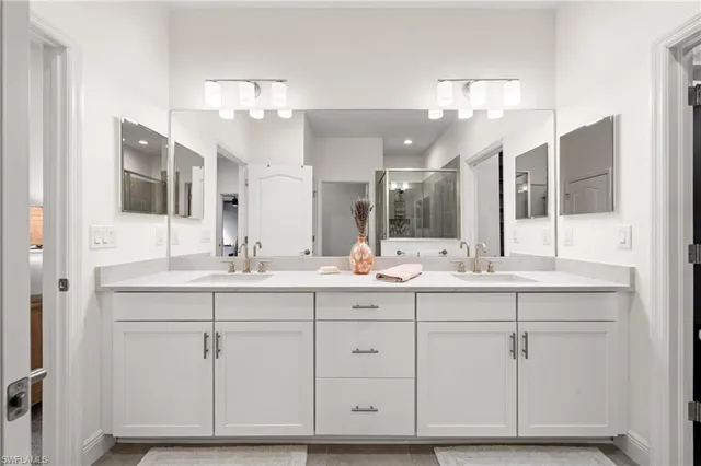 a view of walk in closet and bedroom view