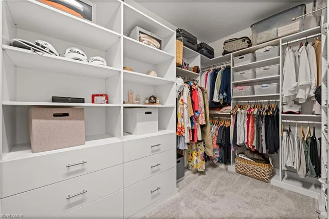 a bed room with a bed and a couch