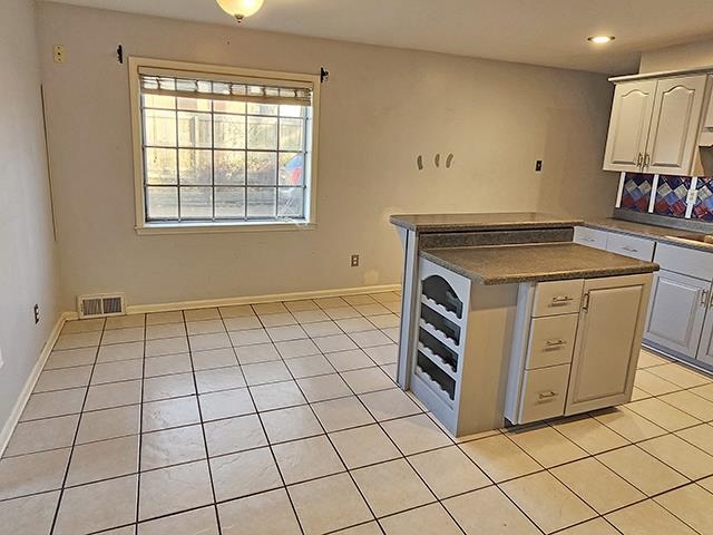 2040 Ridgeway Road Memphis, TN 38119 - Photo 12 of 35 a view of an empty room with a fireplace and a window