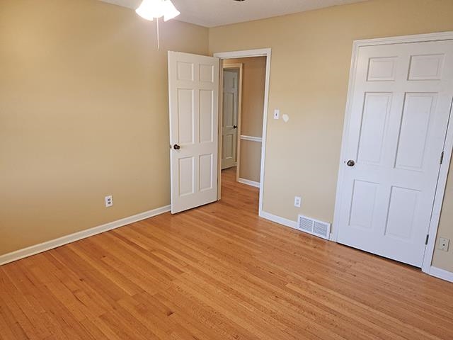 2040 Ridgeway Road Memphis, TN 38119 - Photo 25 of 35 a view of an empty room with wooden floor