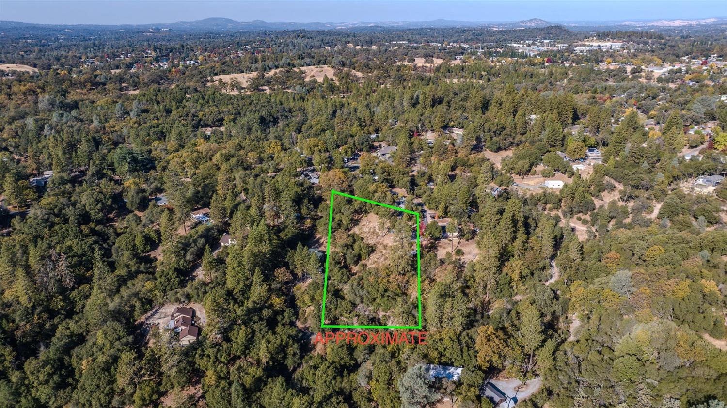 5793 Forest Lake Road Diamond Springs, CA 95619 - Photo 23 of 27 an aerial view of town and residential houses with trees in the background