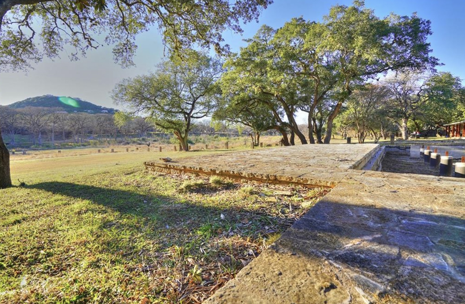 200 Rim Road Wimberley, TX 78676 - Photo 18 of 25 a view of a yard with wooden fence