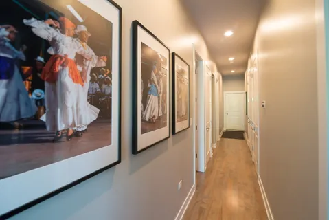 a view of a hallway with a living room