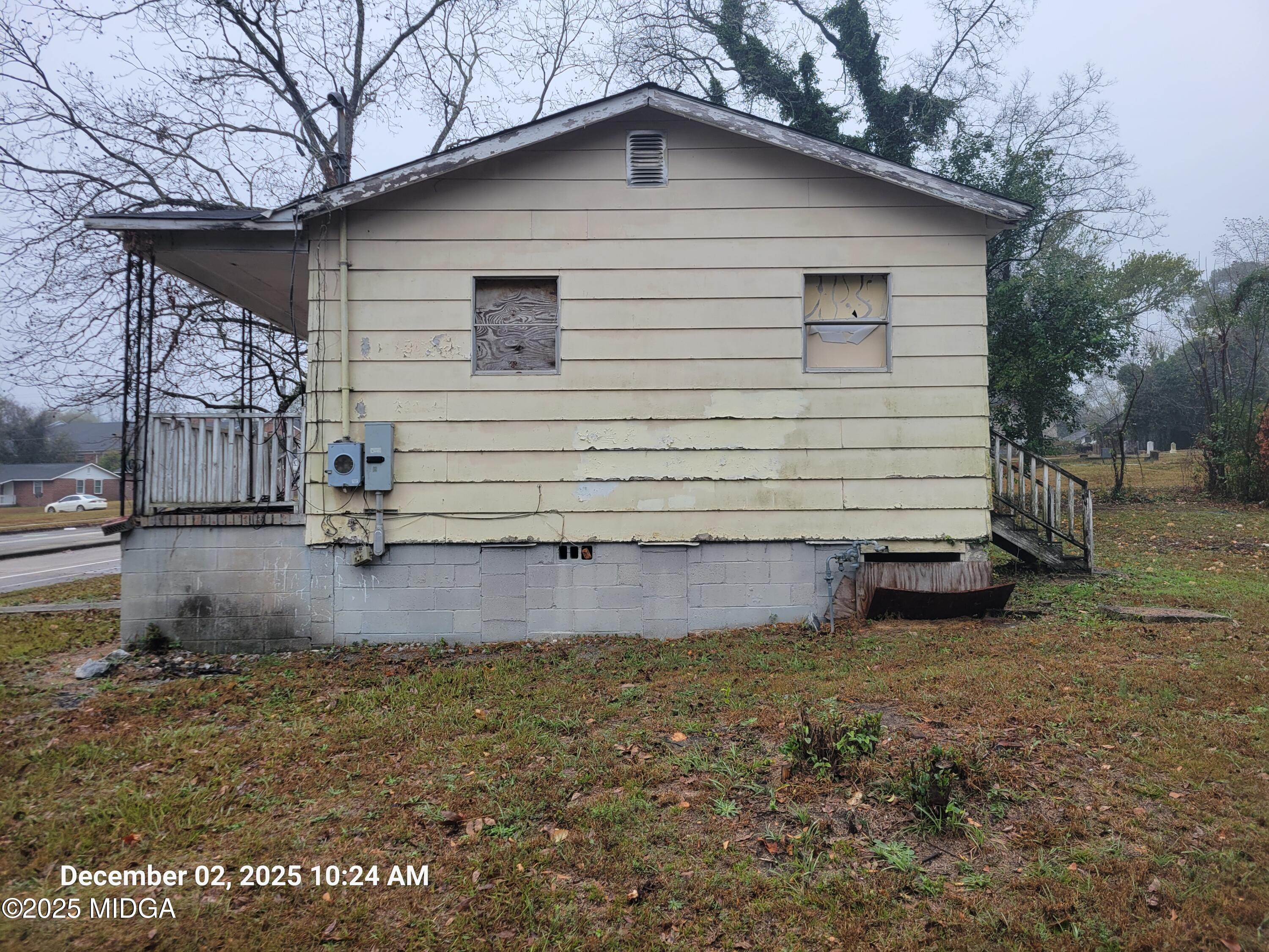 1942 Walnut Street Macon, GA 31201 - Photo 4 of 6 a view of a house with a yard