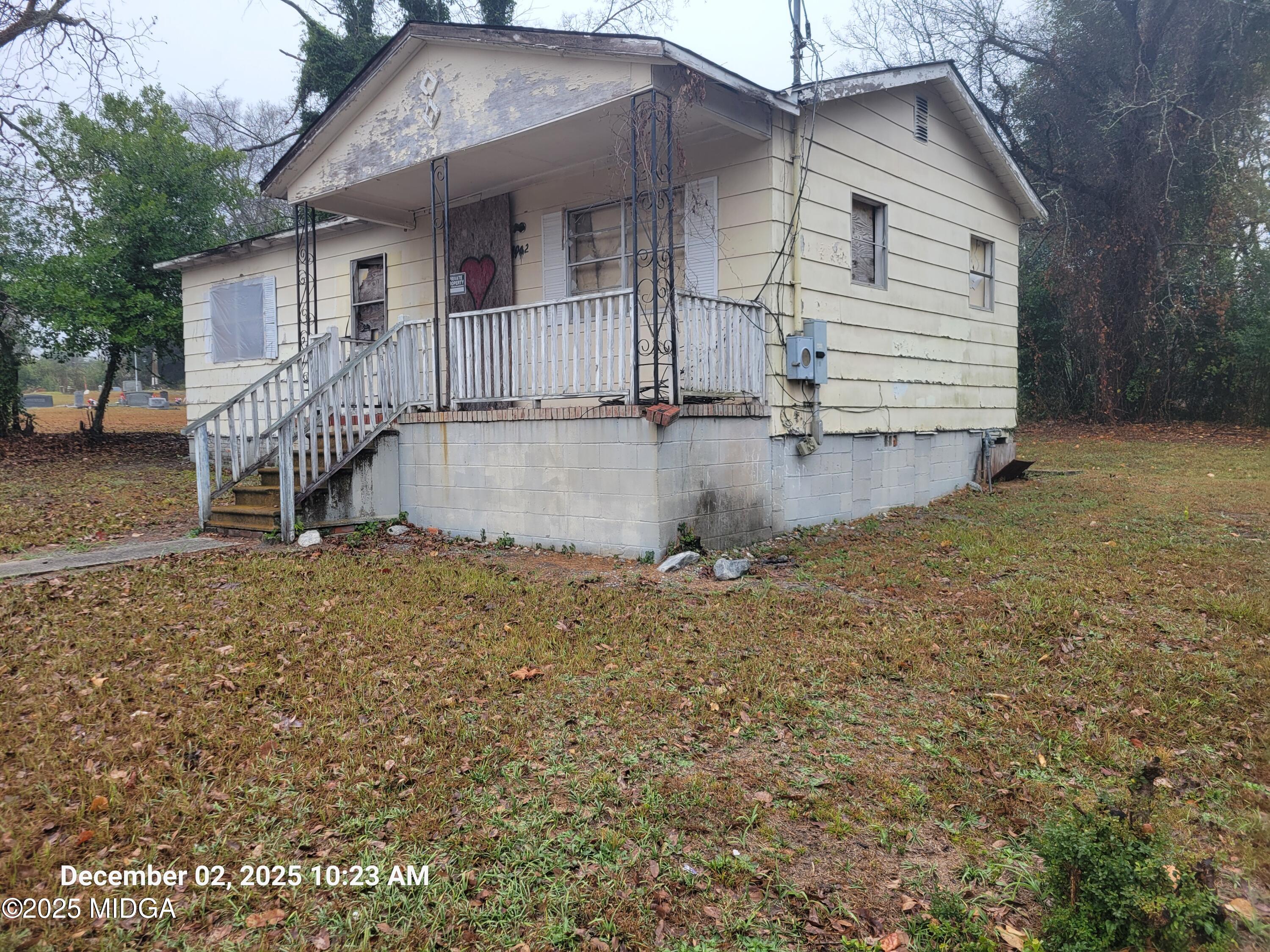 1942 Walnut Street Macon, GA 31201 - Photo 5 of 6 a view of a house with a yard