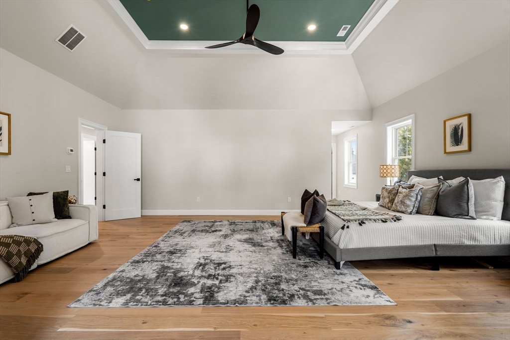 61 Mt Pleasant Street Woburn, MA 01801 - Photo 21 of 39 a living room with furniture and a rug