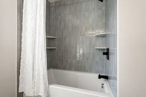 a bathroom with a bathtub