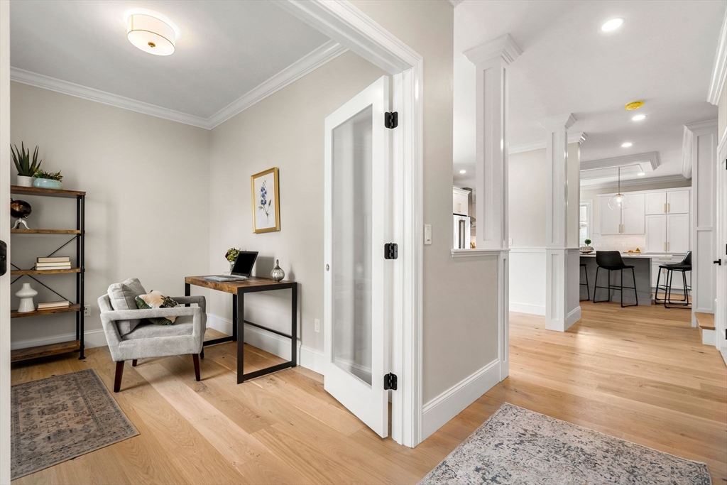 61 Mt Pleasant Street Woburn, MA 01801 - Photo 3 of 39 a view of a livingroom with furniture and furniture