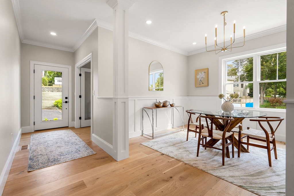 61 Mt Pleasant Street Woburn, MA 01801 - Photo 5 of 39 a view of a a dining room with furniture window and wooden floor