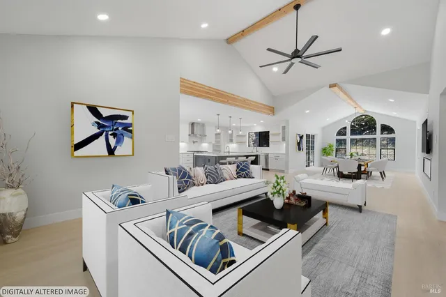 a view of empty room with a ceiling fan and window