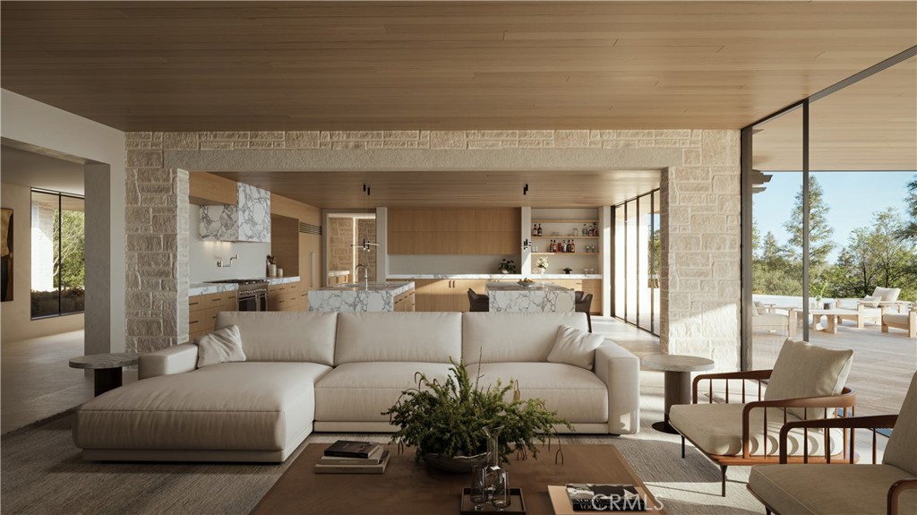 80 Saddleback Road Rolling Hills, CA 90274 - Photo 15 of 43 a living room with furniture and a large window