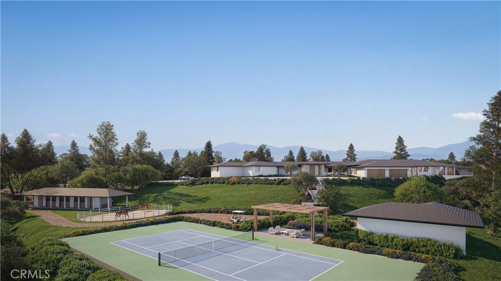 80 Saddleback Road Rolling Hills, CA 90274 - Photo 16 of 43 a view of a swimming pool with lawn chairs and a yard