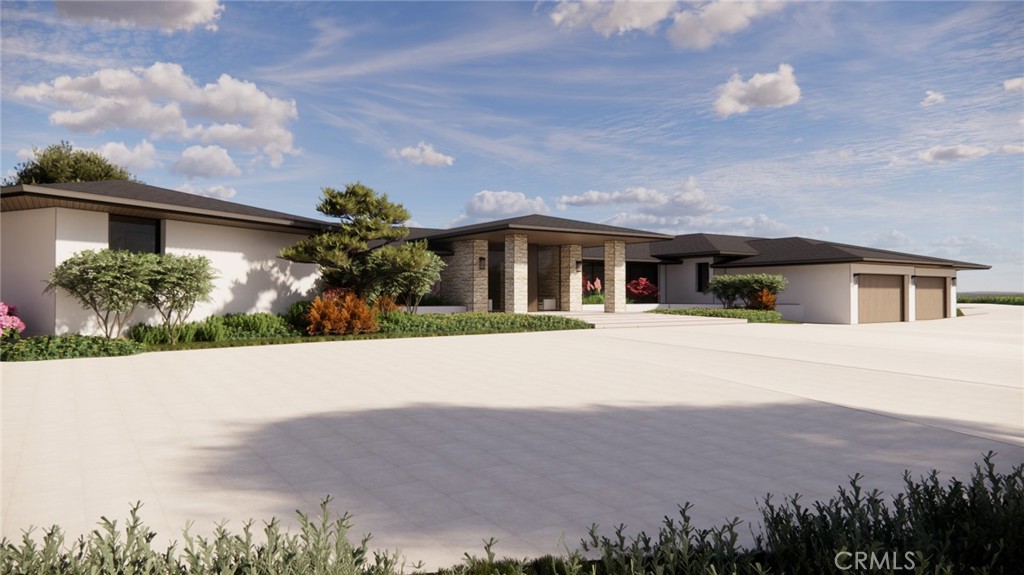 80 Saddleback Road Rolling Hills, CA 90274 - Photo 17 of 43 a front view of house with yard and trees in the background