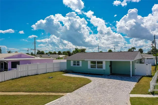 a view of a house with a swimming pool
