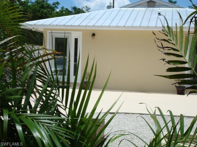 1205 Creech Road Naples, FL 34103 - Photo 2 of 10 a view of outdoor space and yard