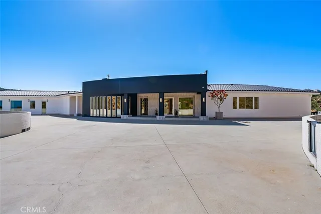 a lobby with furniture and lots of living room