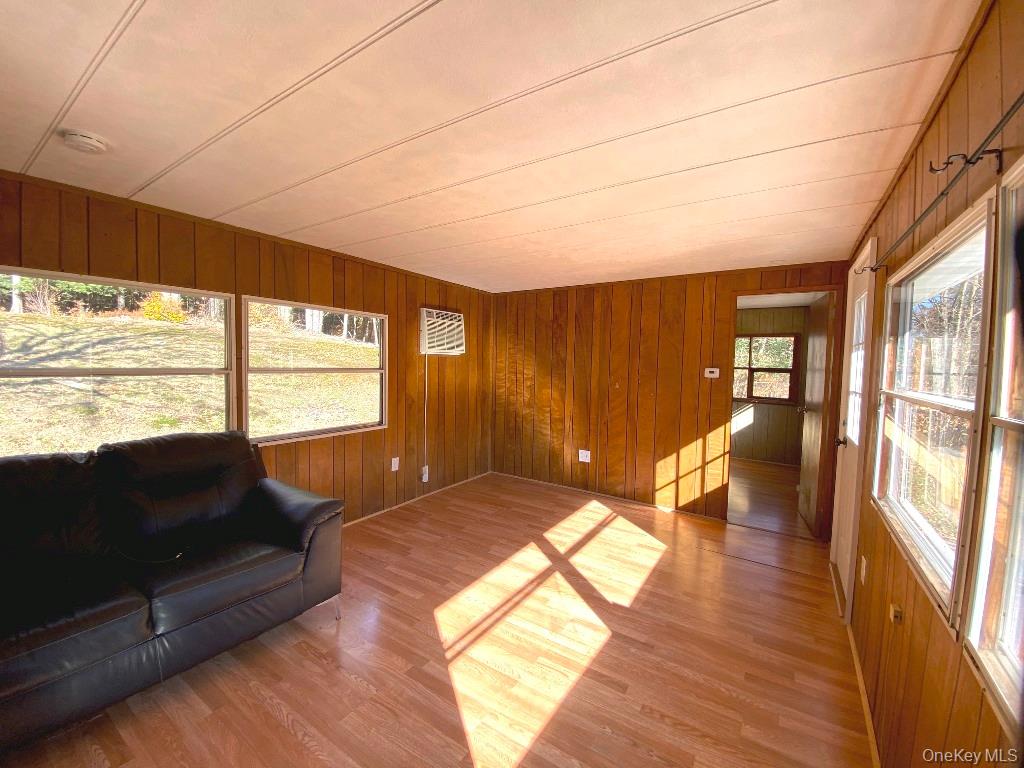 141 Gale Road Mongaup Valley, NY 12762 - Photo 11 of 20 a living room with furniture and a large window