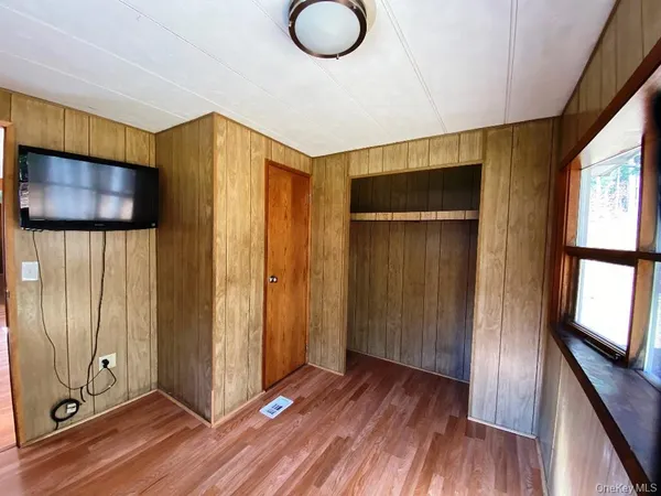 a view of empty room with windows