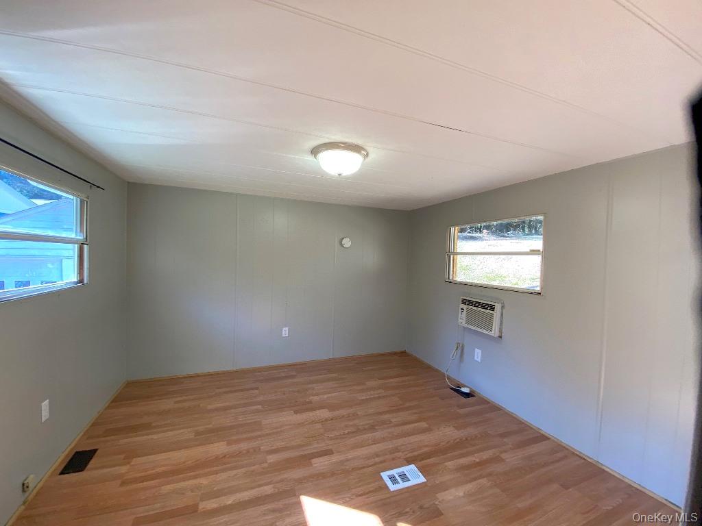 141 Gale Road Mongaup Valley, NY 12762 - Photo 14 of 20 a view of empty room with windows
