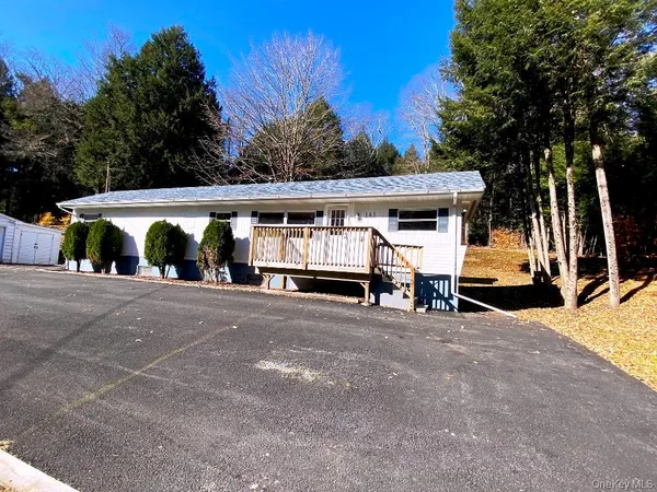a view of patio with a car parked
