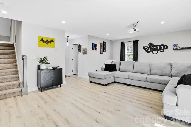 a living room with furniture and a couch