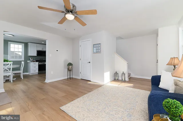 a view of kitchen with furniture and fire place
