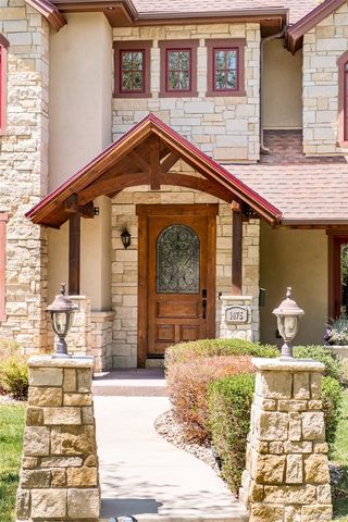 a front view of a house with a outdoor space