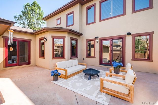 a front view of a house with patio