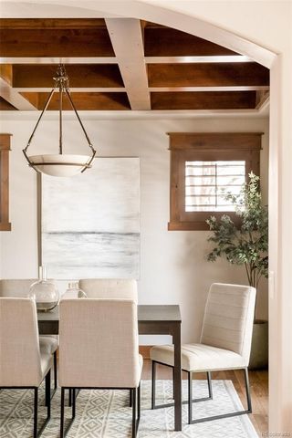 a workspace with wooden floor and a cabinet