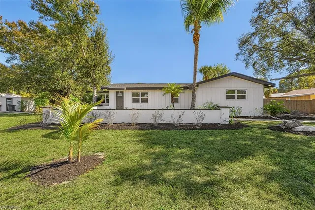 a house view with a garden space