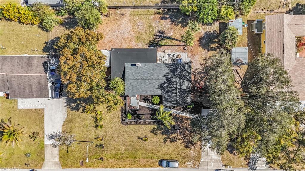 3843 Marvaez Street Fort Myers, FL 33901 - Photo 23 of 26 a aerial view of a house with a yard