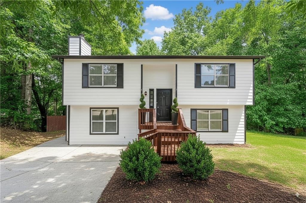 2290 Wilkins Cove Decatur, GA 30035 - Photo 21 of 21 front view of a house with a yard