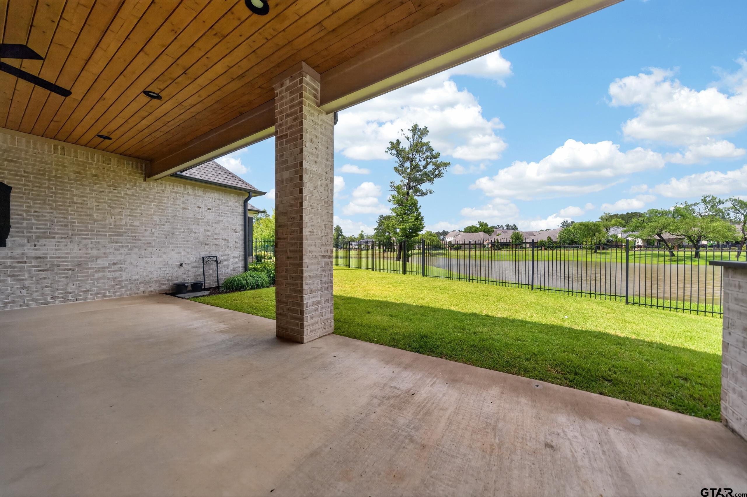 7517 Cross Gate Way Tyler, TX 75703 - Photo 31 of 47 a view of a house with backyard and porch