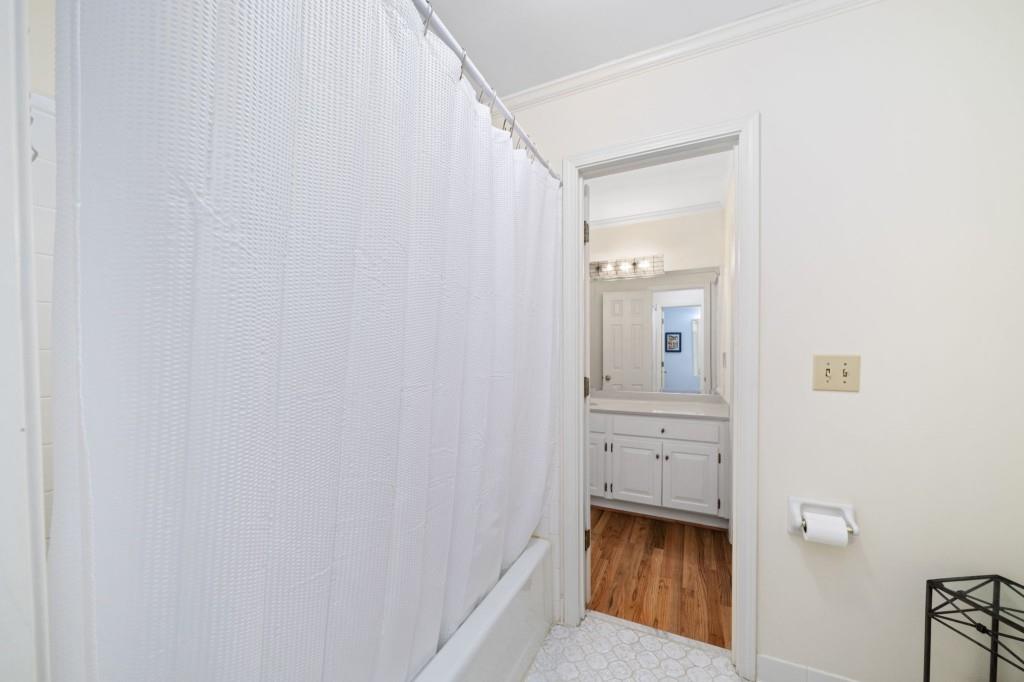 300 Waterpine Court Sandy Springs, GA 30350 - Photo 37 of 53 a view of a hallway with wooden floor and closet