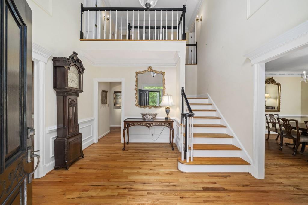 300 Waterpine Court Sandy Springs, GA 30350 - Photo 4 of 53 a view of entryway and hall with wooden floor