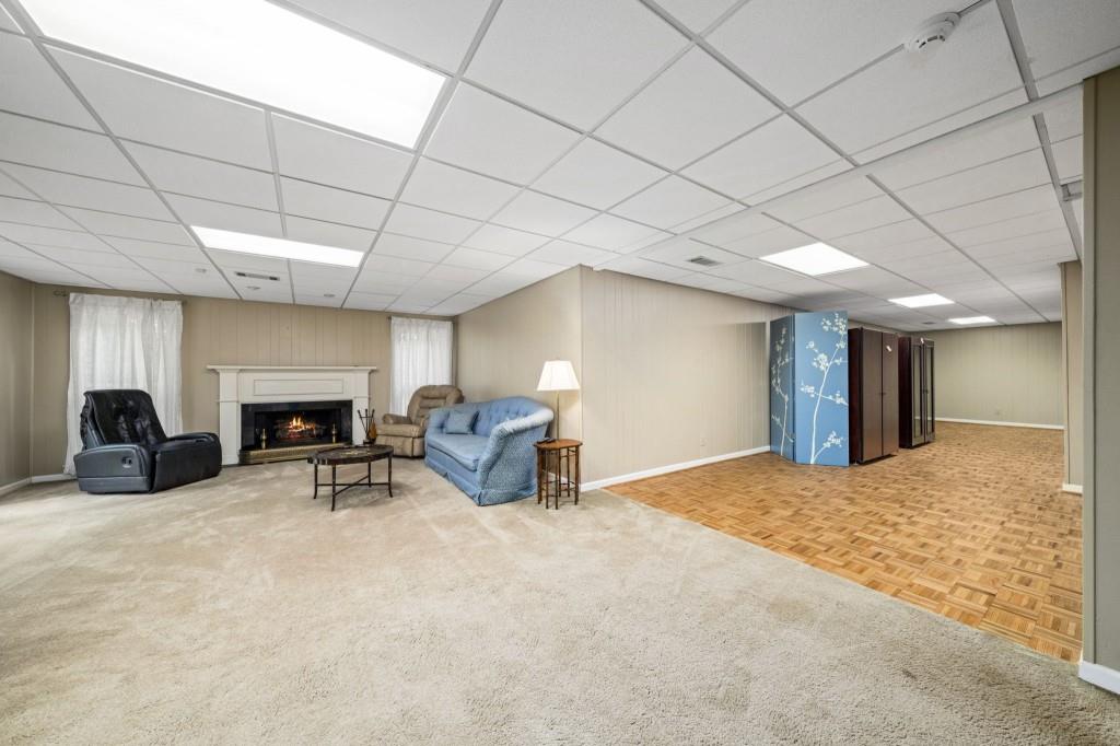 300 Waterpine Court Sandy Springs, GA 30350 - Photo 42 of 53 a view of a livingroom with furniture and a fireplace