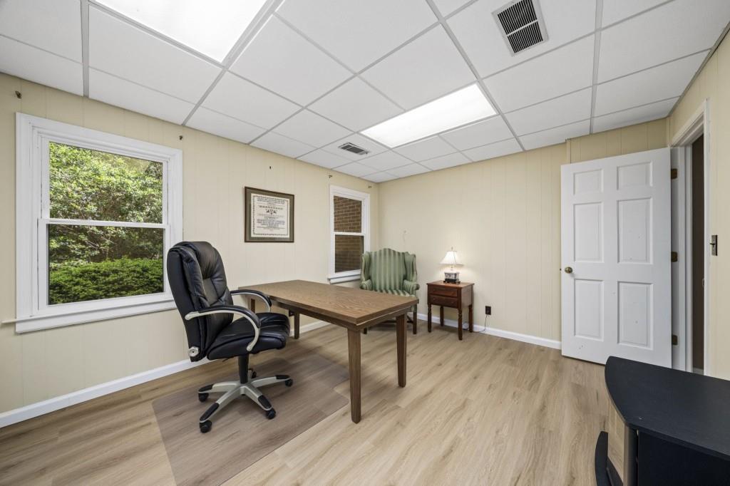 300 Waterpine Court Sandy Springs, GA 30350 - Photo 43 of 53 a view of a workspace with furniture and a window