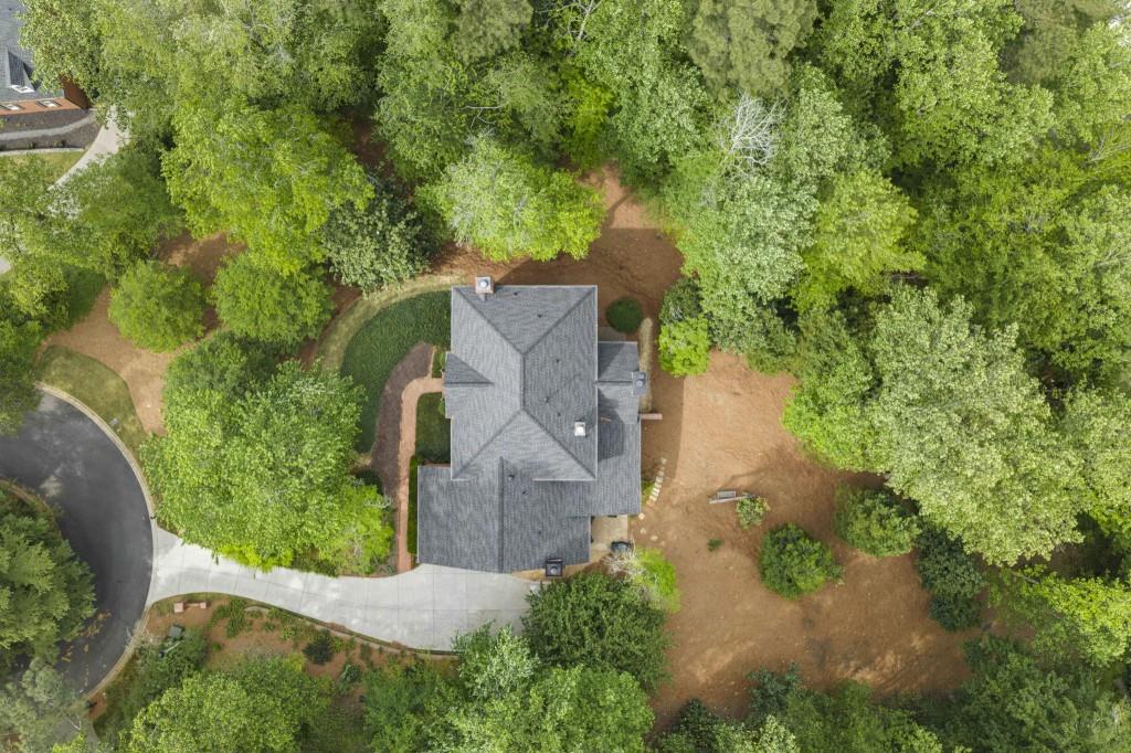 300 Waterpine Court Sandy Springs, GA 30350 - Photo 53 of 53 an aerial view of a house with a yard and trees all around