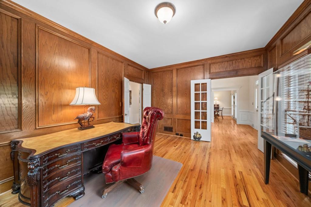 300 Waterpine Court Sandy Springs, GA 30350 - Photo 6 of 53 a room with wooden floor and furniture