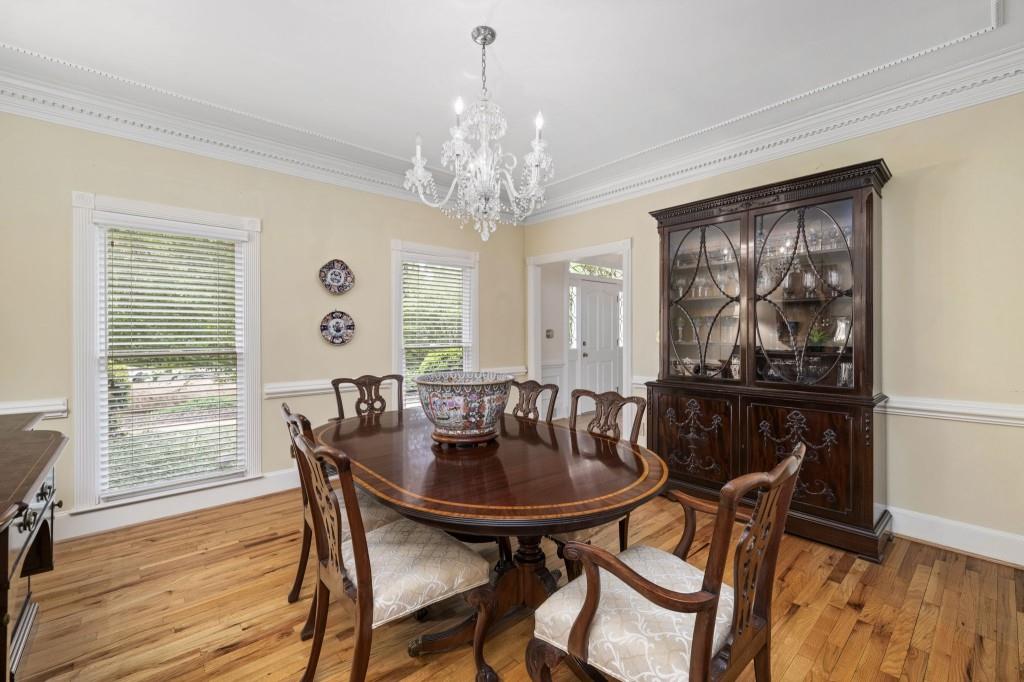 300 Waterpine Court Sandy Springs, GA 30350 - Photo 8 of 53 a view of a dining room with furniture window and wooden floor